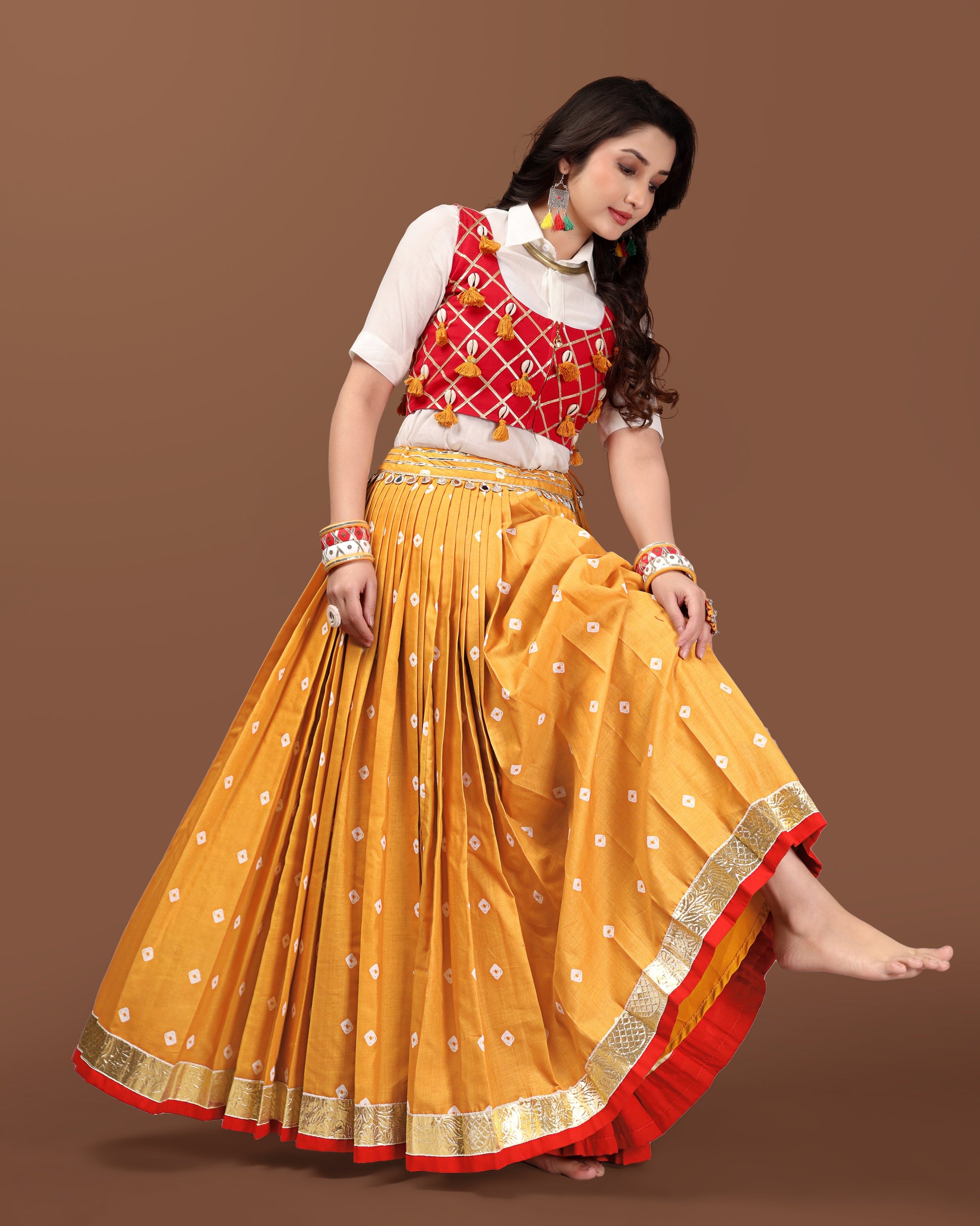MUSTARD BANDHANI SKIRT WITH RED JACKET CHANIYA CHOLI RAAS'25 HANDMADEAHOLIC BY MISHKA