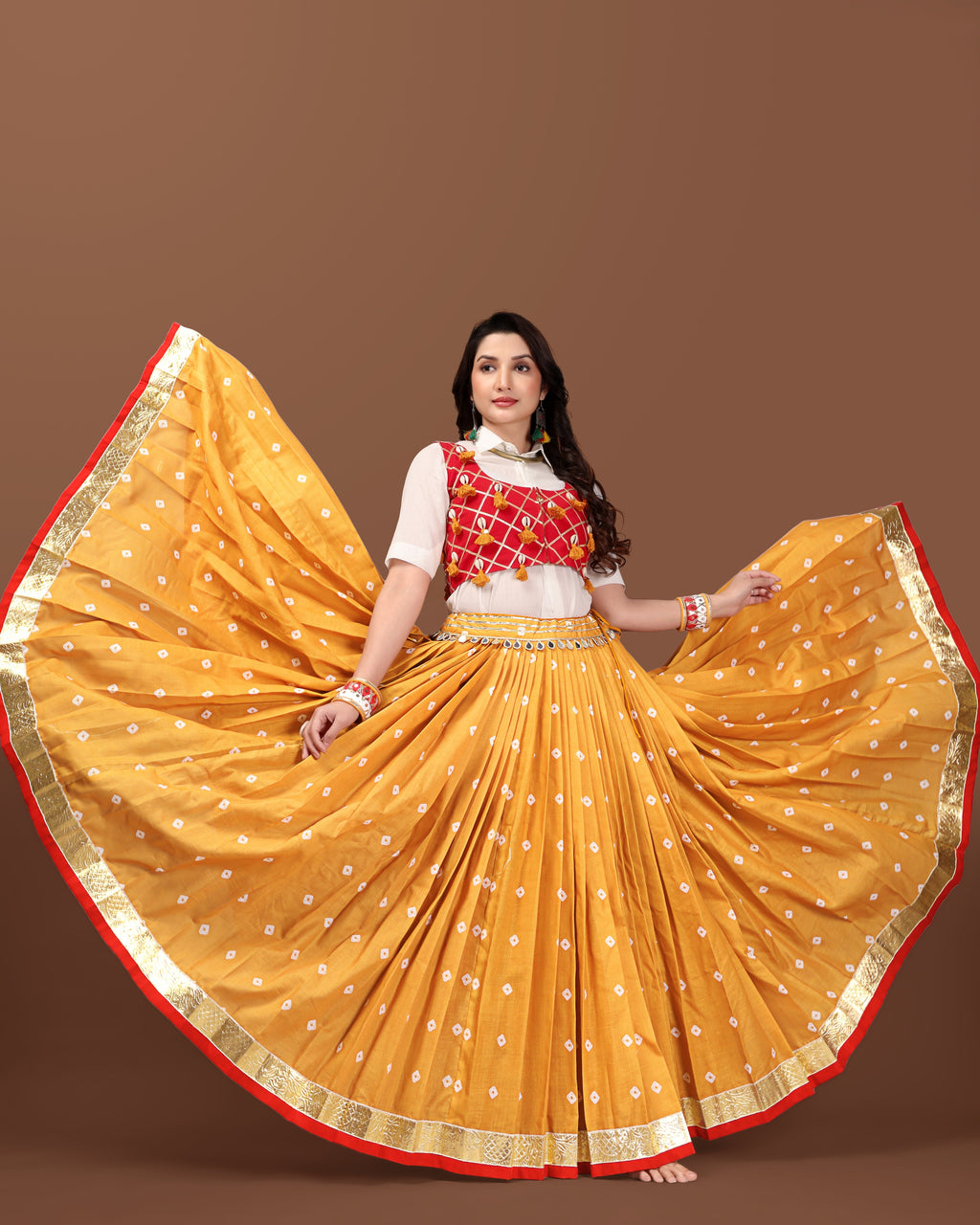 MUSTARD BANDHANI SKIRT WITH RED JACKET CHANIYA CHOLI RAAS'25 HANDMADEAHOLIC BY MISHKA