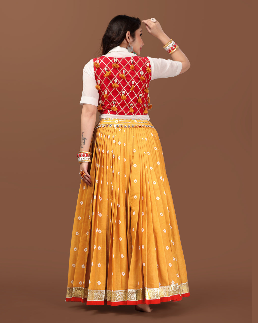 MUSTARD BANDHANI SKIRT WITH RED JACKET CHANIYA CHOLI RAAS'25 HANDMADEAHOLIC BY MISHKA