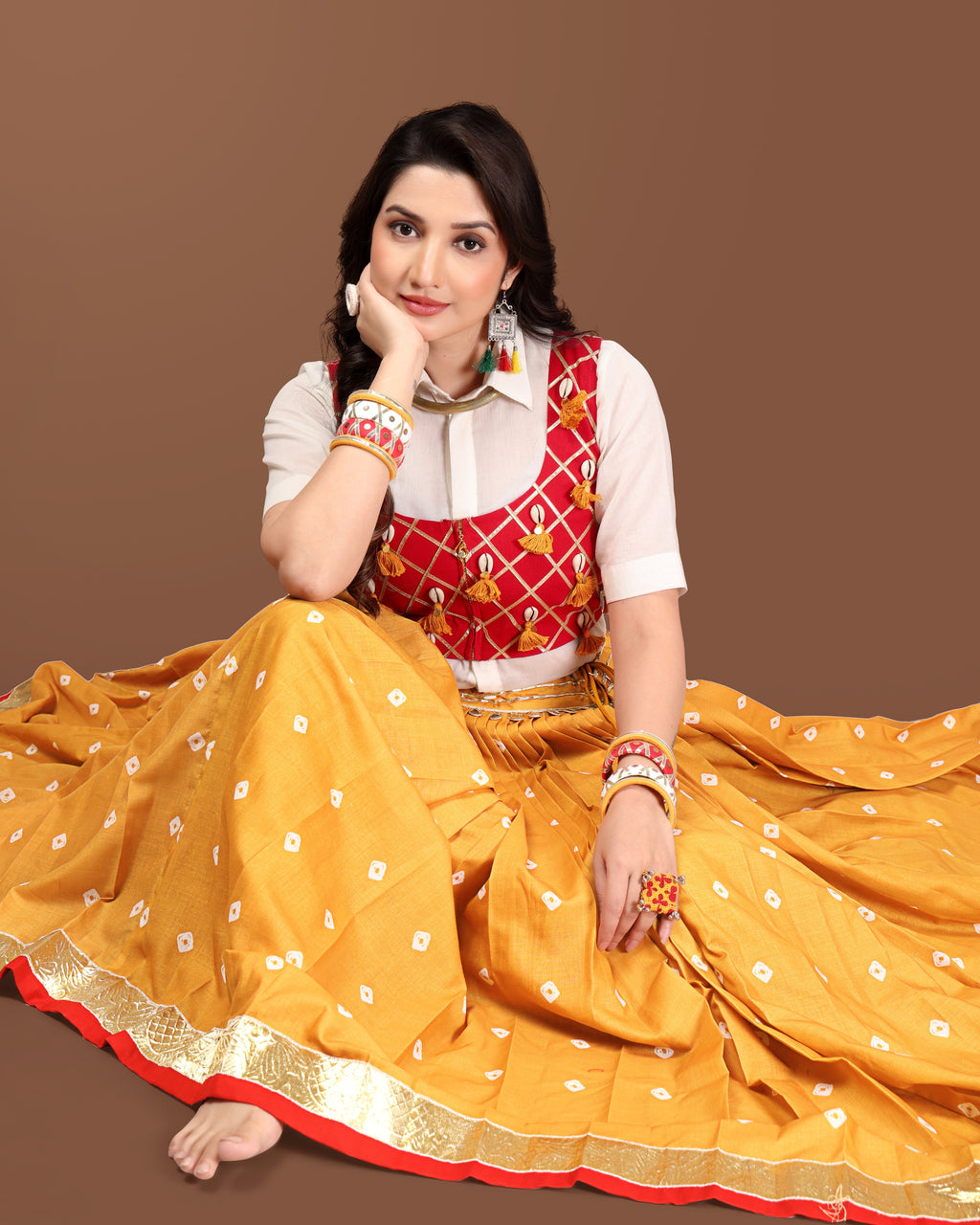 MUSTARD BANDHANI SKIRT WITH RED JACKET CHANIYA CHOLI RAAS'25 HANDMADEAHOLIC BY MISHKA