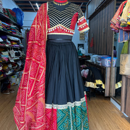 RED AND GREEN CHANIYA CHOLI WITH RED BANDHNI DUPPTA HANDMADEAHOLIC BY MISHKA